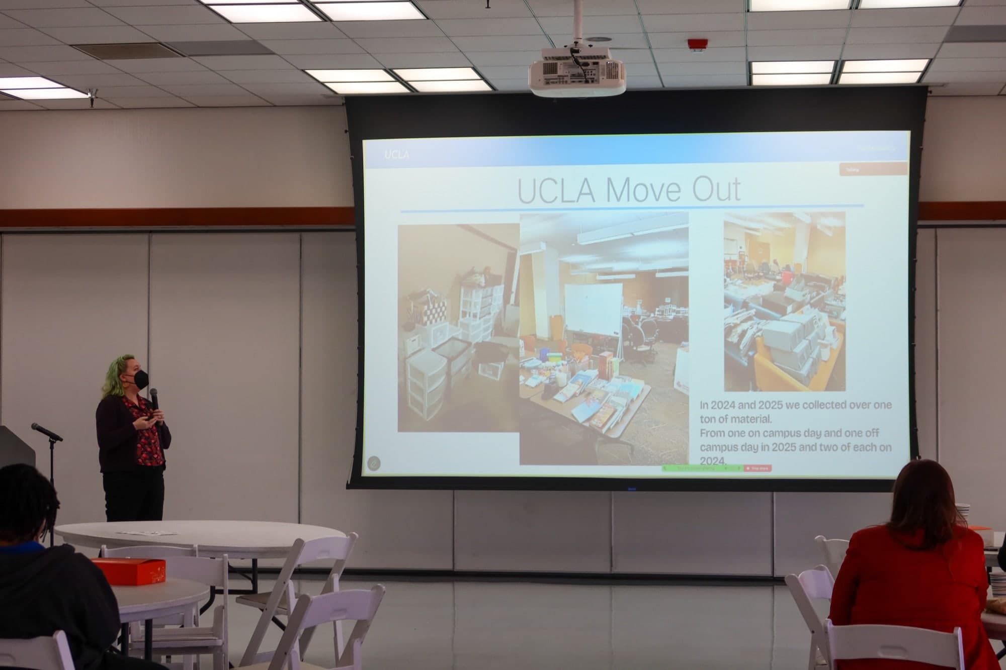 Jade Goegebuer presents beside a slide headed UCLA Move Out, showing photographs of sorted donated items on tables